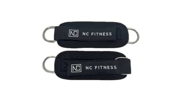 NC Fitness black velcro ankle Straps for Weightlifting and for use with cable machines, laid out flat showing D ring attachments